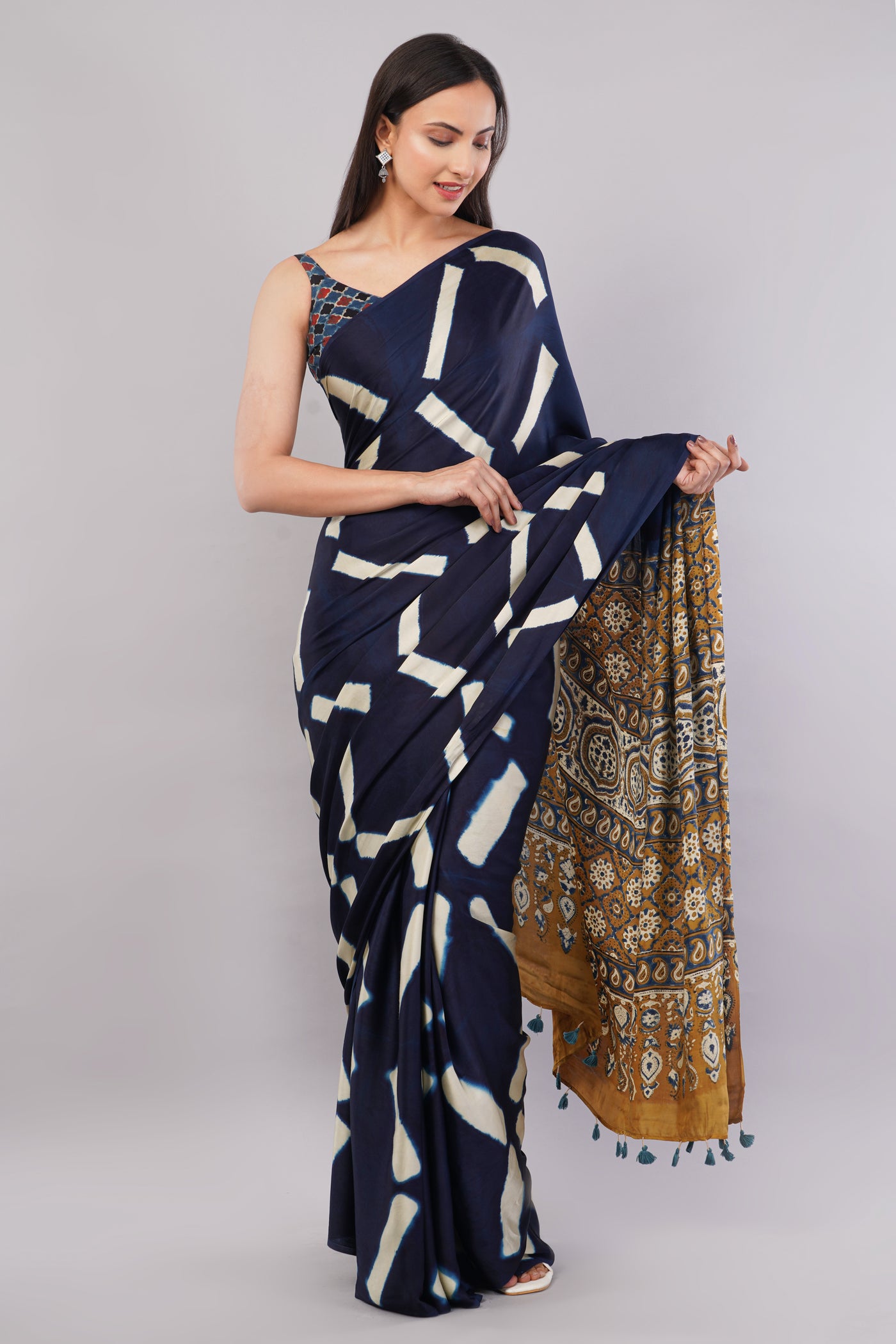 Ridhima:Handmade Clamp Dyed- Ajrakh Modal Silk Saree