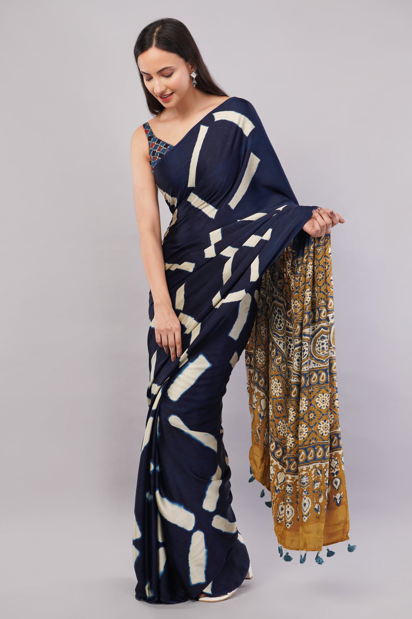 Ridhima:Handmade Clamp Dyed- Ajrakh Modal Silk Saree