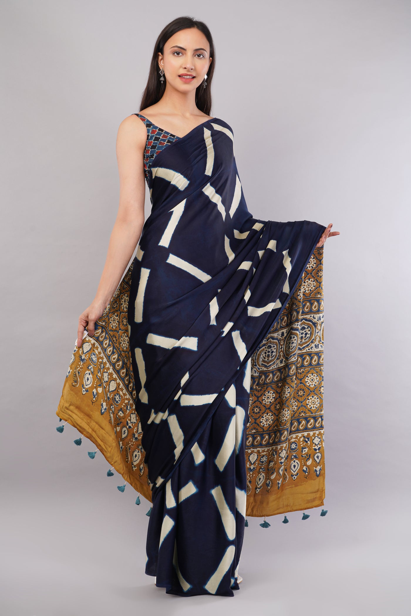 Ridhima:Handmade Clamp Dyed- Ajrakh Modal Silk Saree