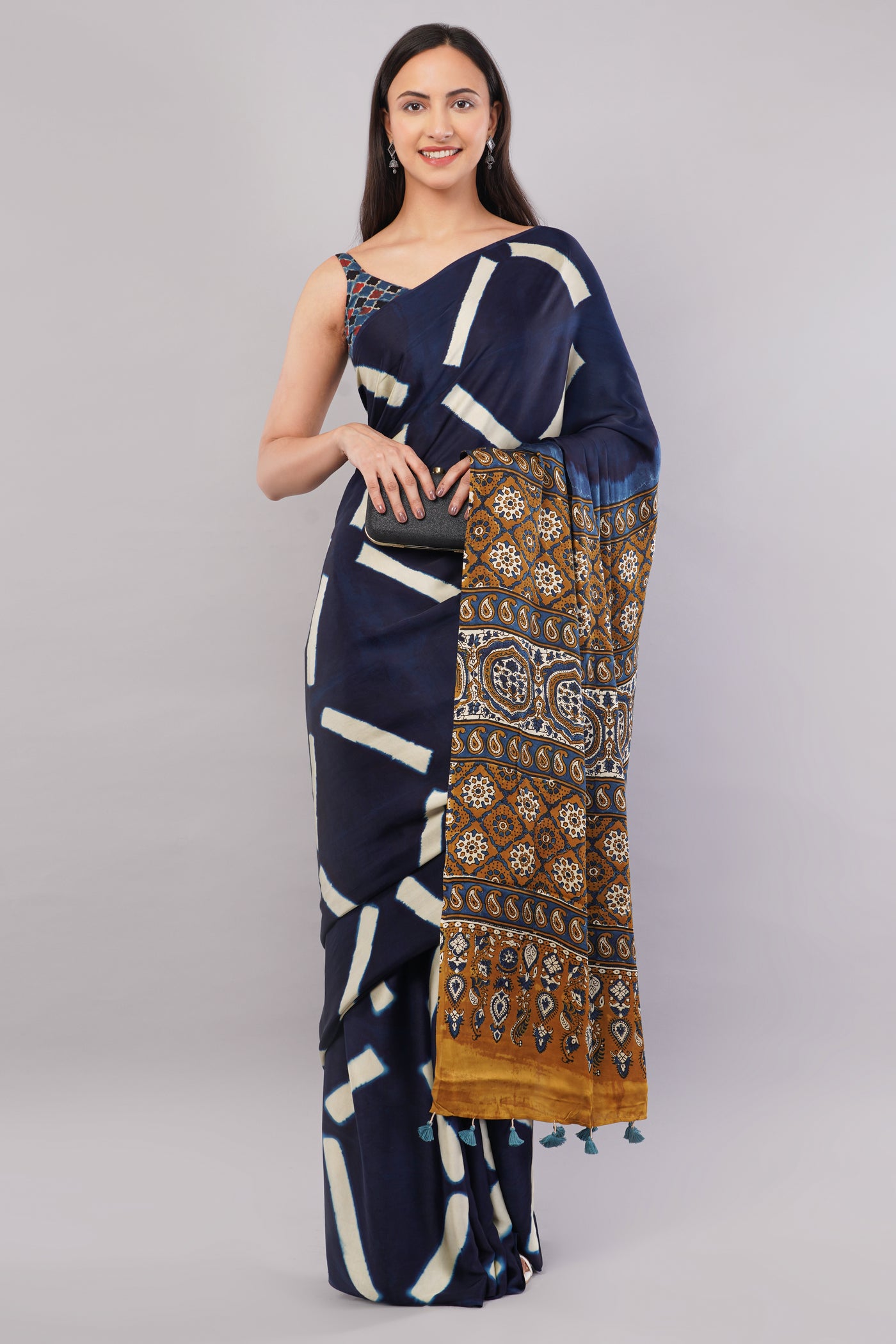 Ridhima:Handmade Clamp Dyed- Ajrakh Modal Silk Saree