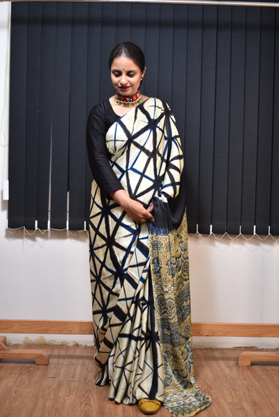 OJASWINI: Handmade Clamp Dyed- Ajrakh Modal Silk Saree