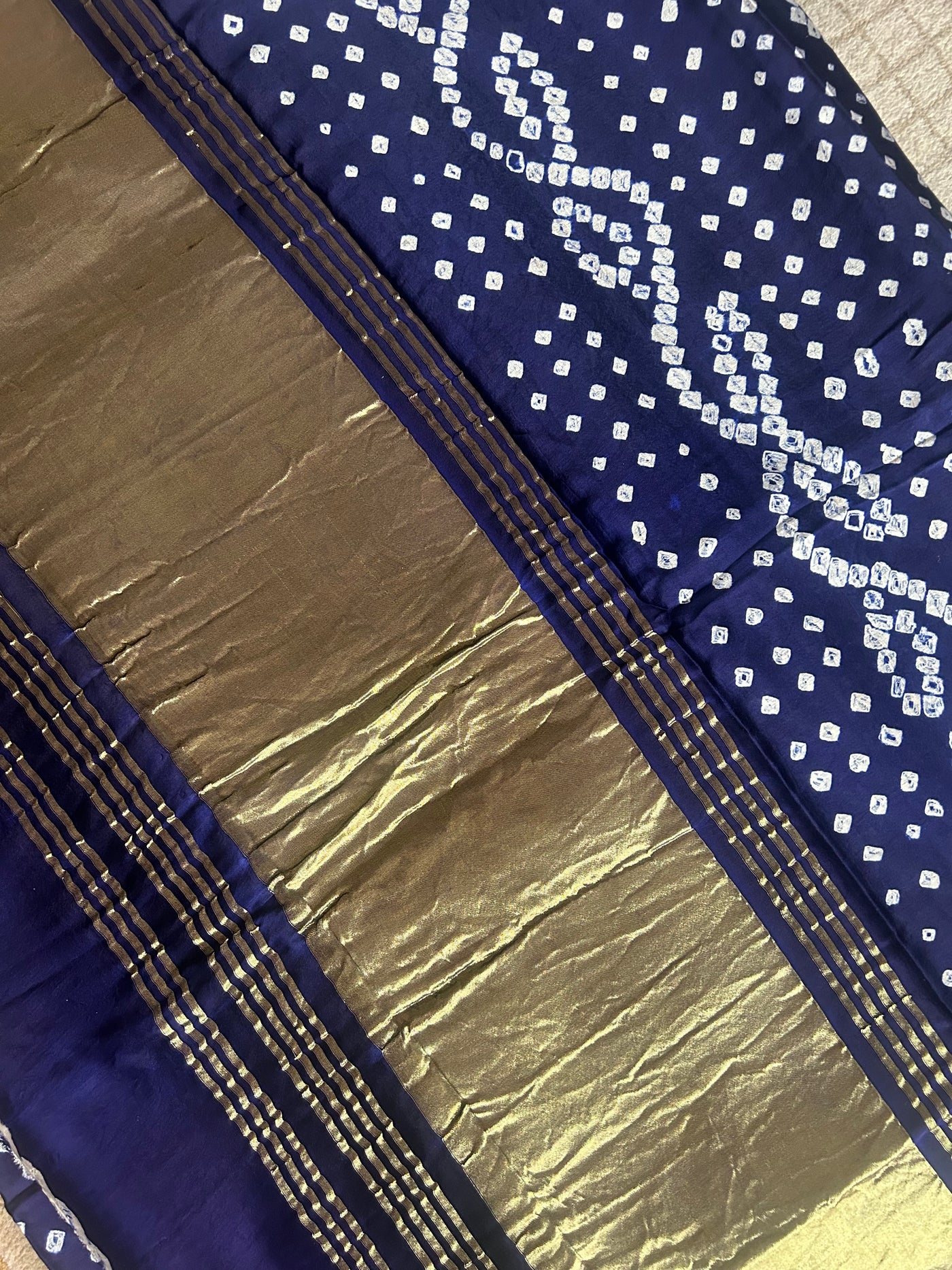 Nalini: bandhani saree with tissue palla