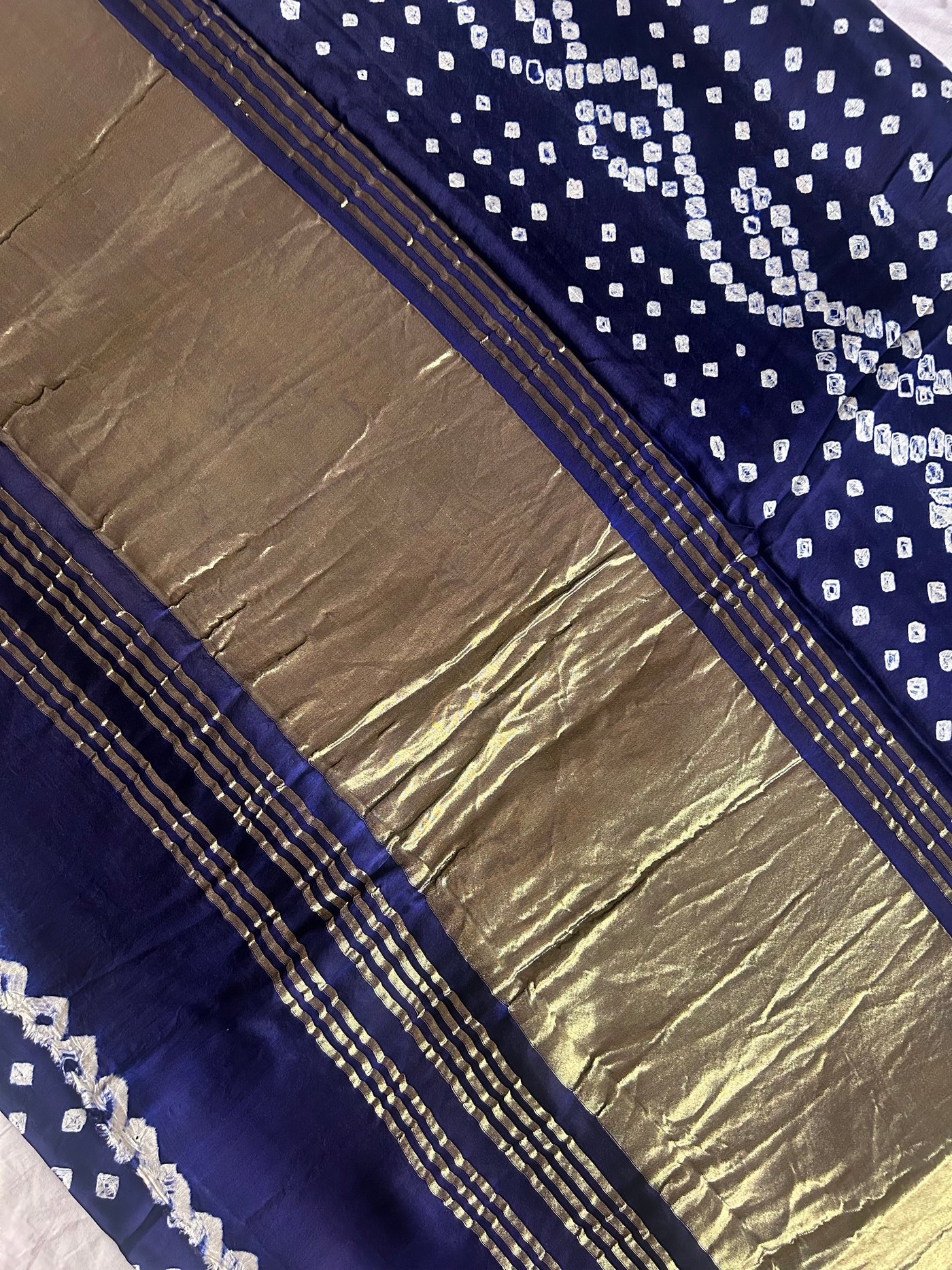 Nalini: bandhani saree with tissue palla