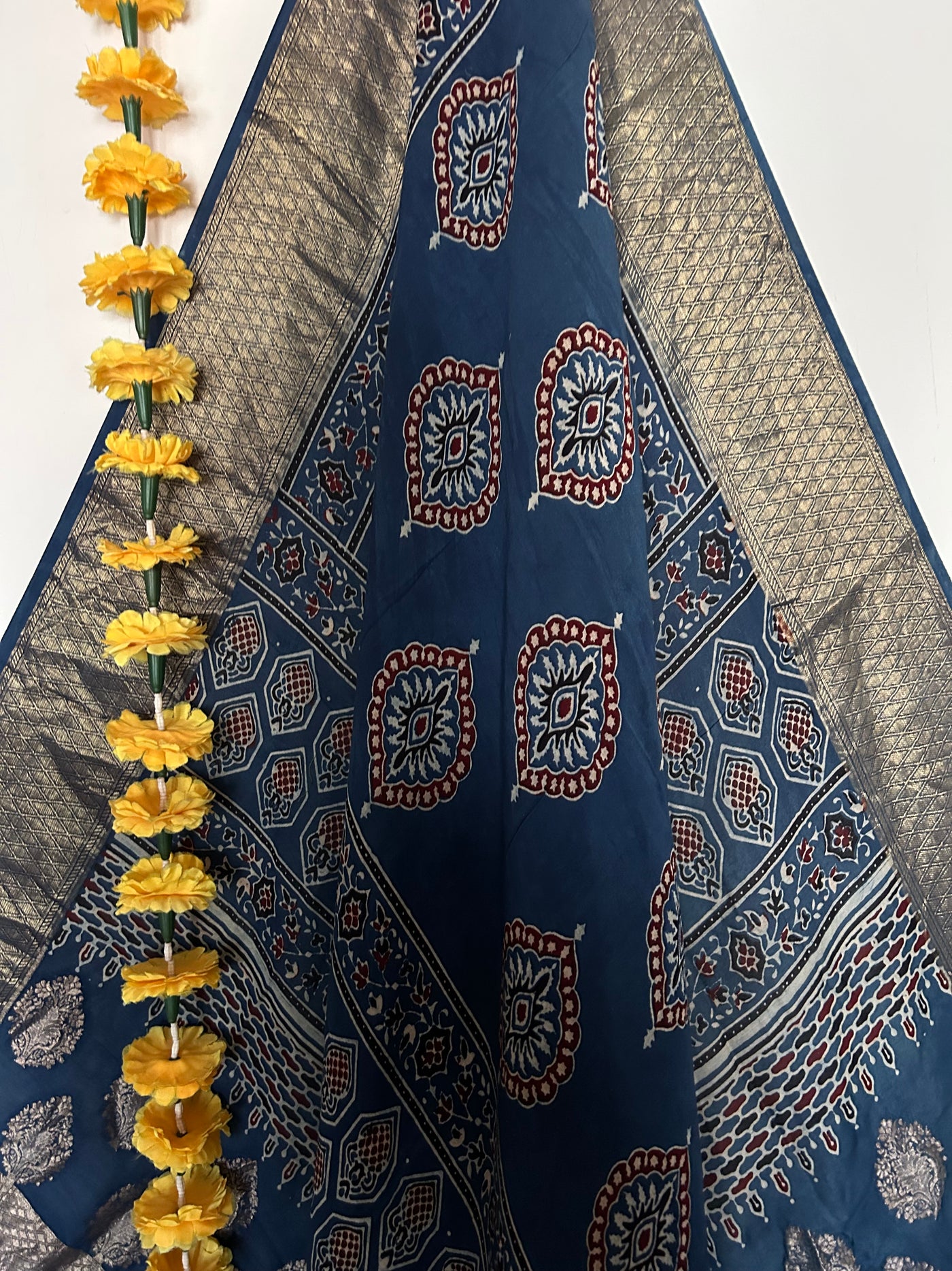 Khushboo: Handblock dola silk ajrakh dupatta with nakshi border