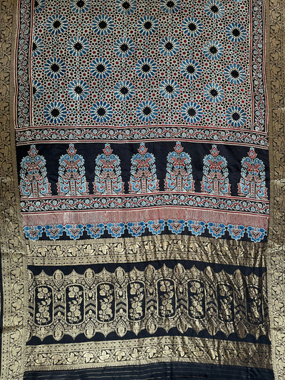 Dreamy Black:Handblock Ajrakh Dola Silk Saree With Meenakari Pallu.