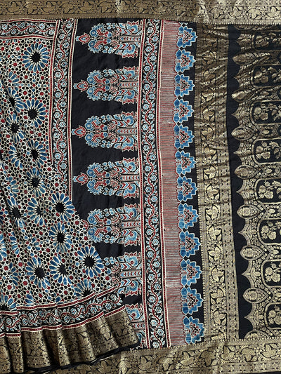 Dreamy Black:Handblock Ajrakh Dola Silk Saree With Meenakari Pallu.