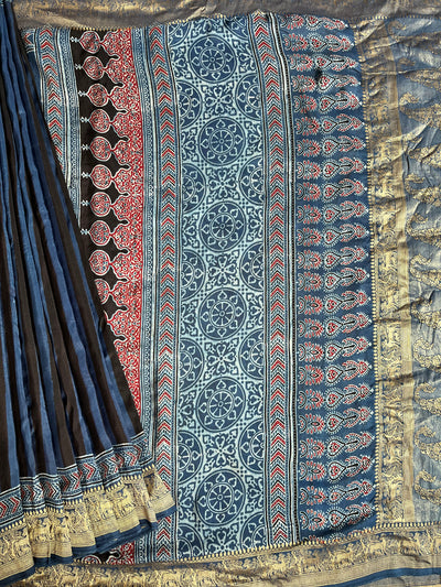Kaushiki:Handblock Ajrakh Dola Silk Saree With Meenakari Pallu.