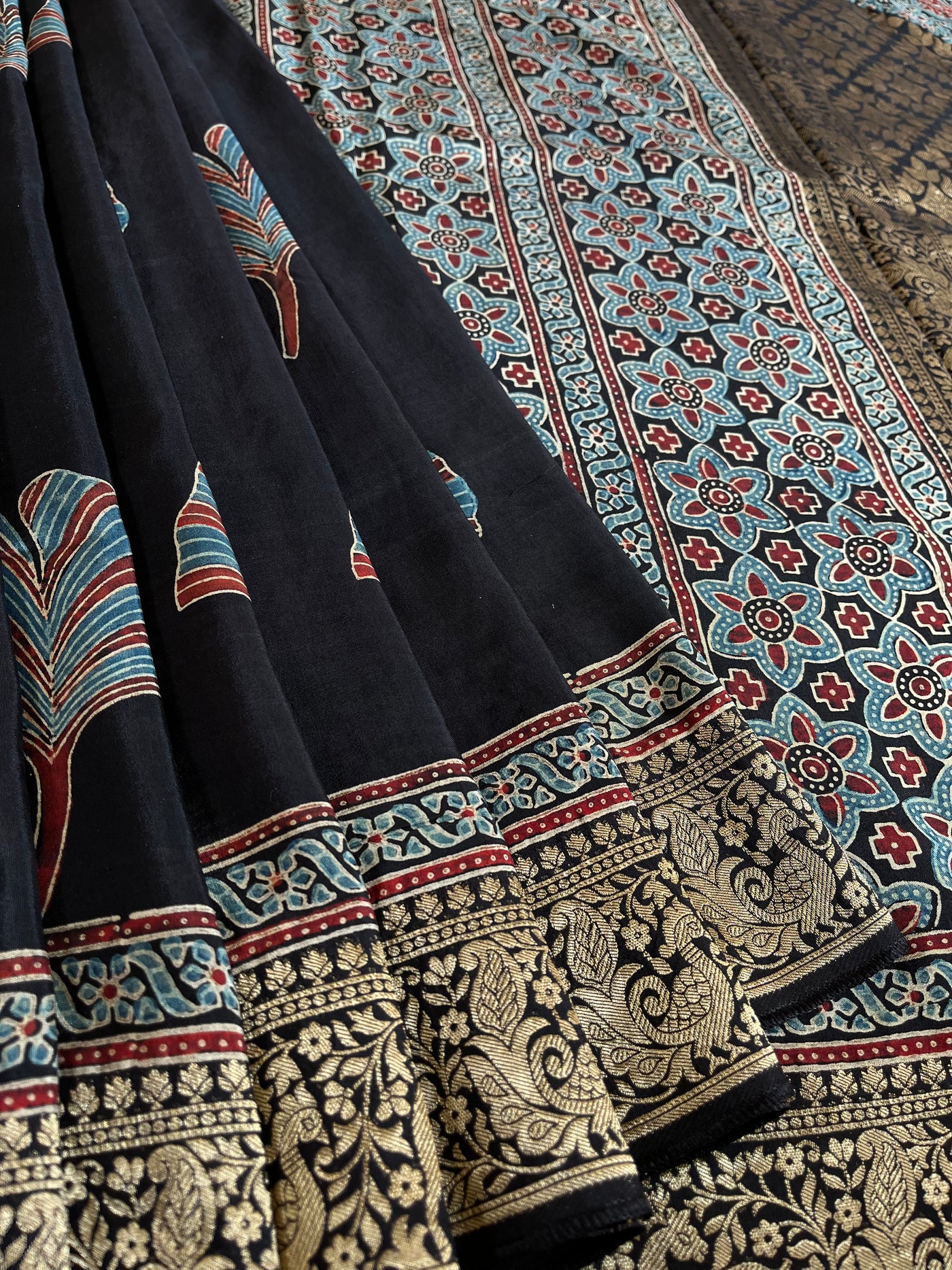 Neelima: HANDBLOCK AJRAKH DOLA SILK SAREE WITH MEENAKARI PALLU.