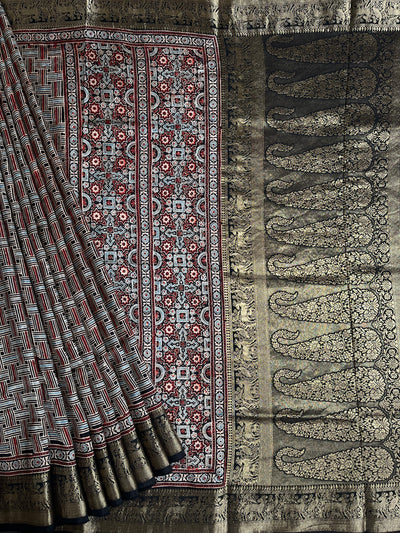 PRACHI:Handblock Ajrakh Dola Silk Saree with Meenakari Pallu