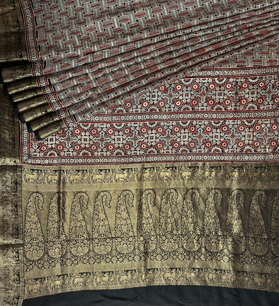 PRACHI:Handblock Ajrakh Dola Silk Saree with Meenakari Pallu