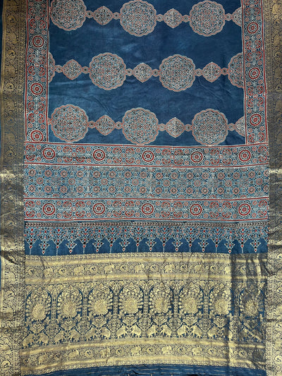 KAMLEYA:Handblock Ajrakh Dola Silk Saree with Meenakari Pallu