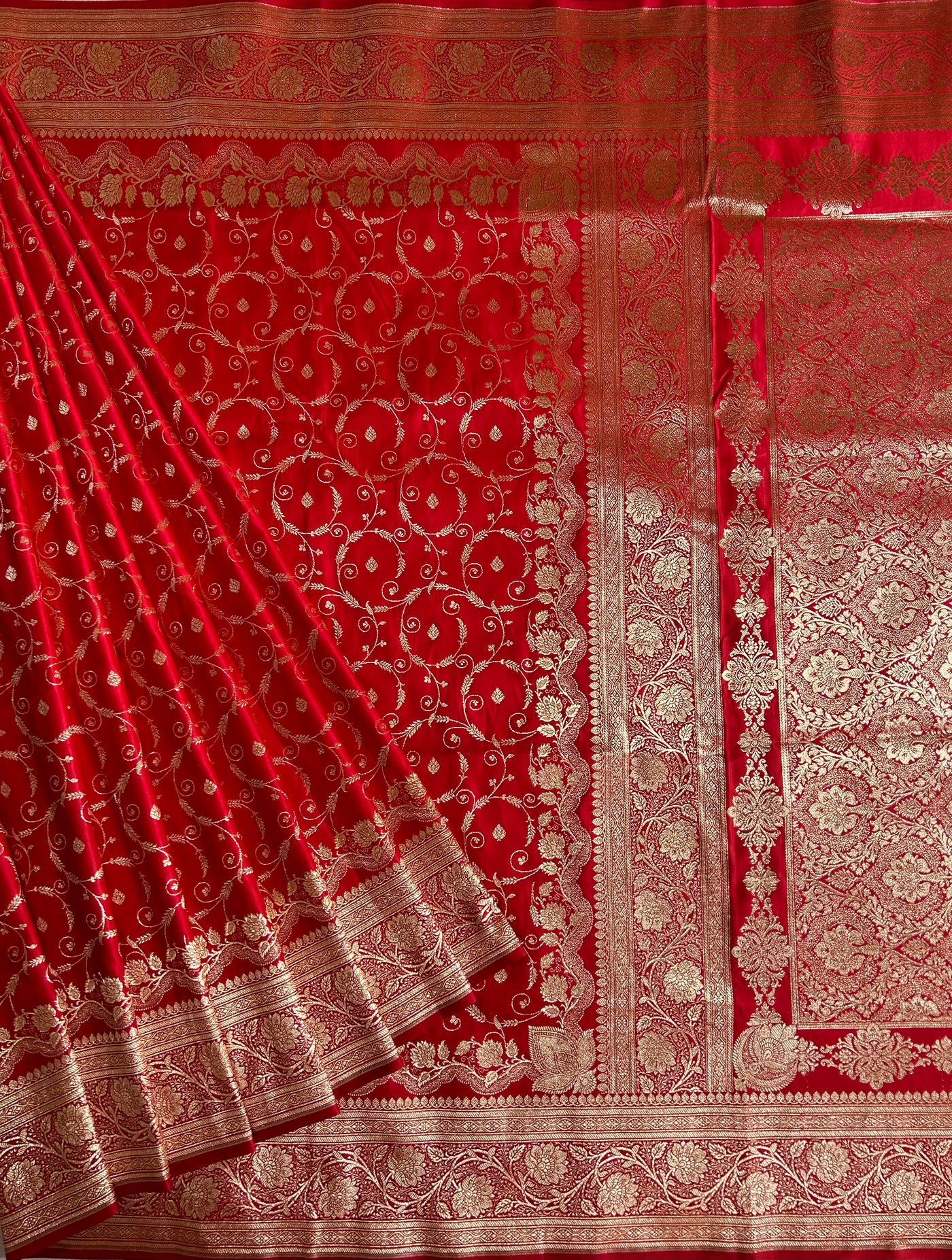 RANGRASIYA : RED, WEDDING WEAR BANARASI KATAN SILK SAREE WITH JAAL WORK.