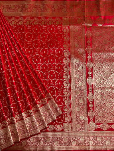 RANGRASIYA : RED, WEDDING WEAR BANARASI KATAN SILK SAREE WITH JAAL WORK.