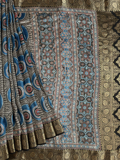 SUBHI:Handblock Ajrakh Dola Silk Saree with Meenakari Pallu