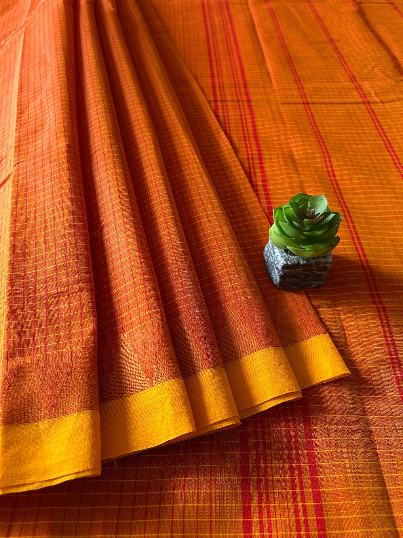 GENDA: ORANGE,KANCHIPURAM PURE COTTON SAREE WITH BORDERS.