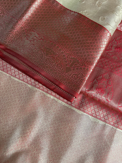 NILAY:CREAM, PARTYWEAR BANARASI TANCHUI SAREE WITH ZARI PALLU.