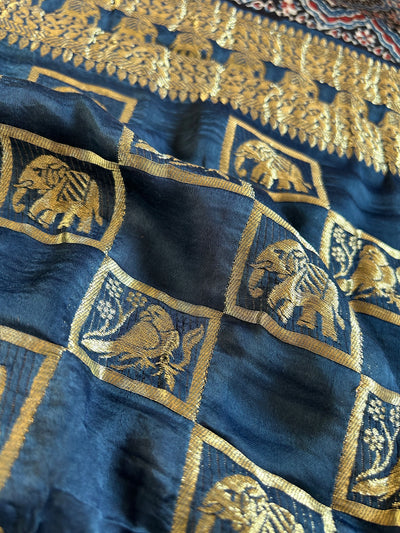 HANSHA: Handblock Printed Ajrakh Modal Silk Meenakari Pallu Saree