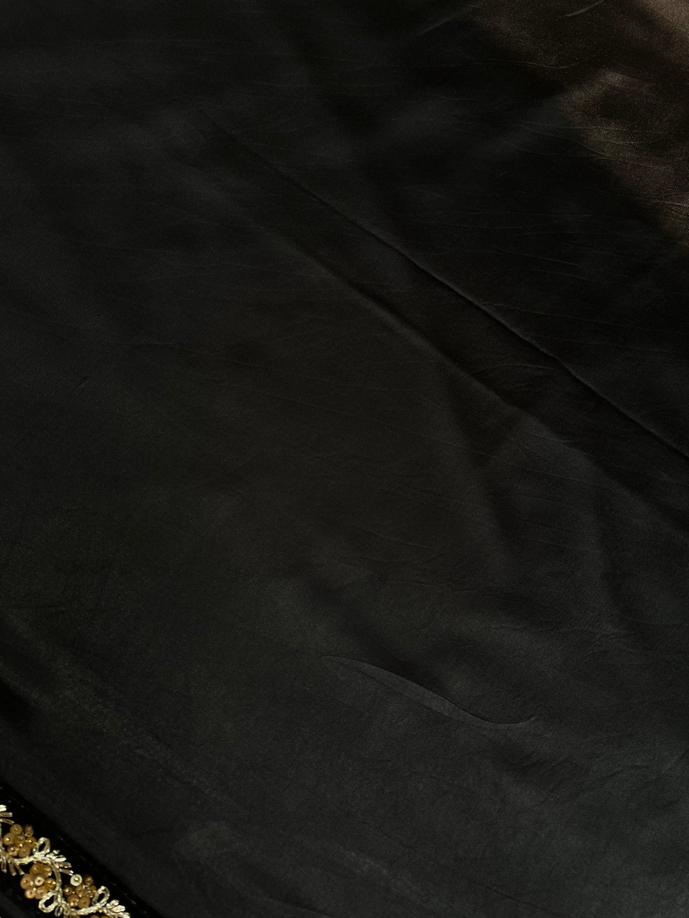 CHANDANI: Solid black modal silk with lace border saree
