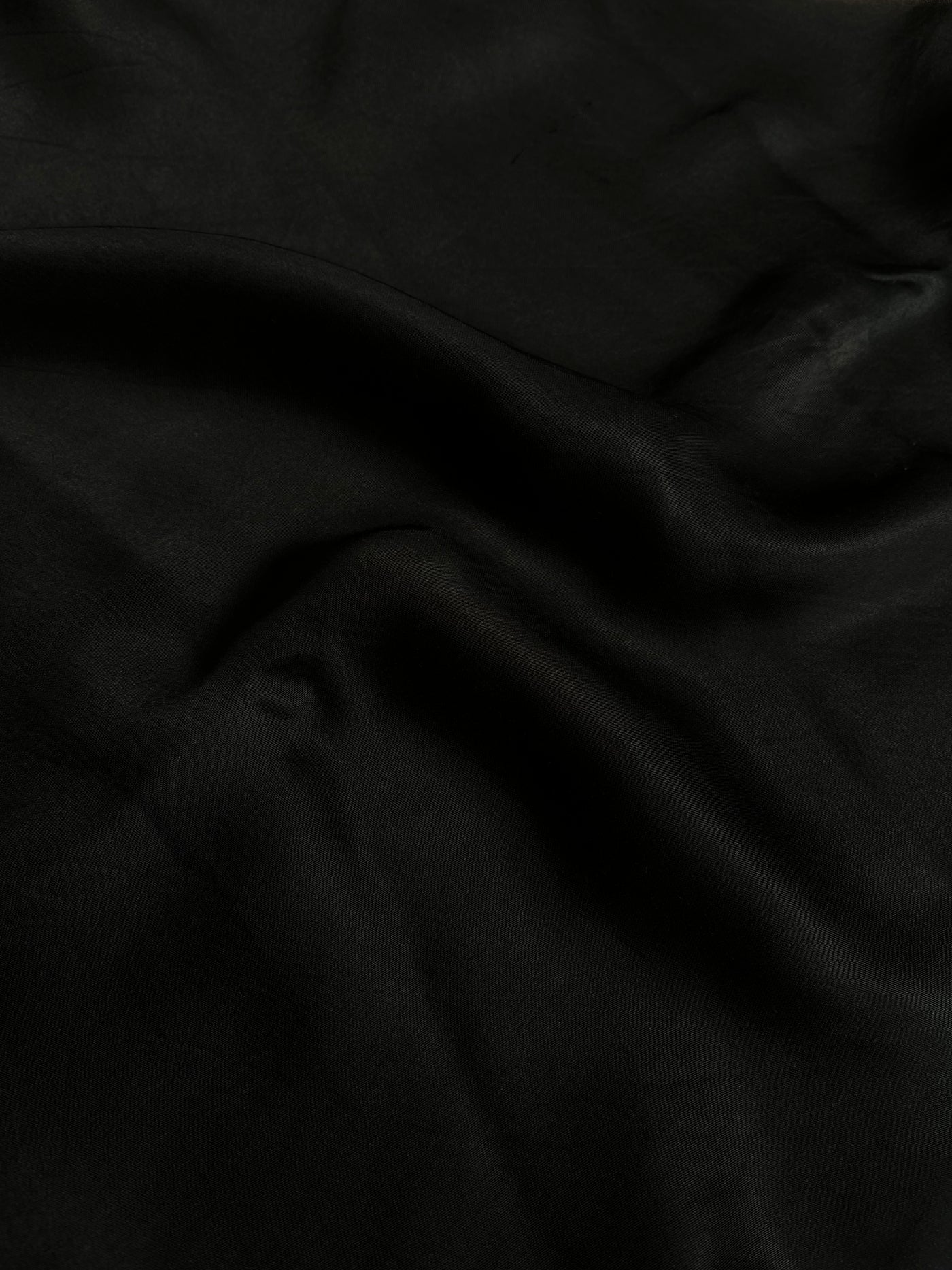 CHANDANI: Solid black modal silk with lace border saree