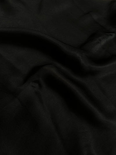 CHANDANI: Solid black modal silk with lace border saree