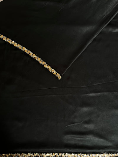 CHANDANI: Solid black modal silk with lace border saree