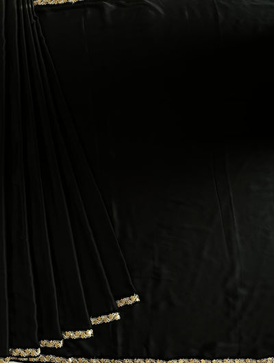 CHANDANI: Solid black modal silk with lace border saree