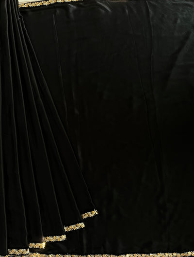 CHANDANI: Solid black modal silk with lace border saree