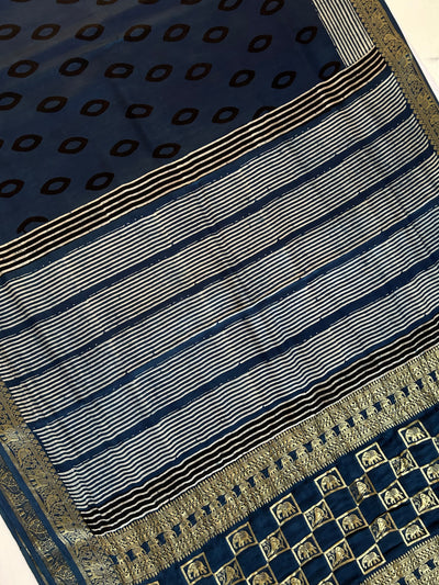 Neelima: Handblock printed Ajrakh Modal Silk Meenakari Pallu Saree