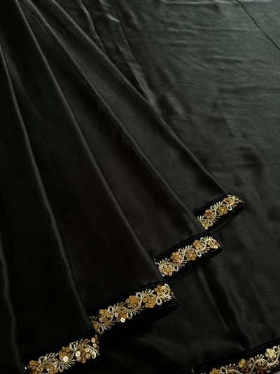 CHANDANI: Solid black modal silk with lace border saree