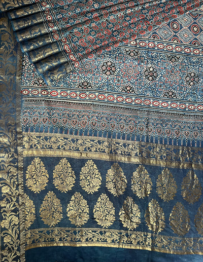 APOORVA: Handblock Ajrakh Dola Silk Saree with Meenakari Pallu