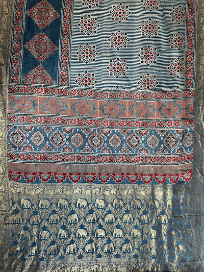 RUCHIKA: Handblock Ajrakh Dola Silk Saree with Meenakari Pallu