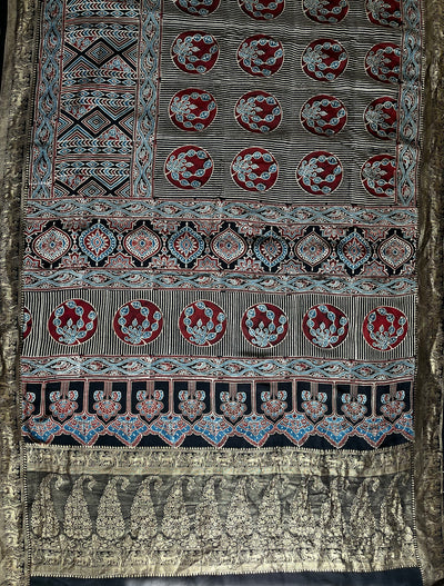 HEMA: Handblock Ajrakh Dola Silk Saree with Meenakari Pallu