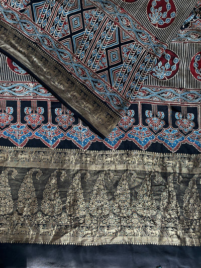 HEMA: Handblock Ajrakh Dola Silk Saree with Meenakari Pallu