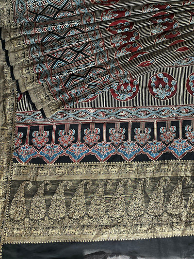 HEMA: Handblock Ajrakh Dola Silk Saree with Meenakari Pallu