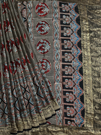 HEMA: Handblock Ajrakh Dola Silk Saree with Meenakari Pallu