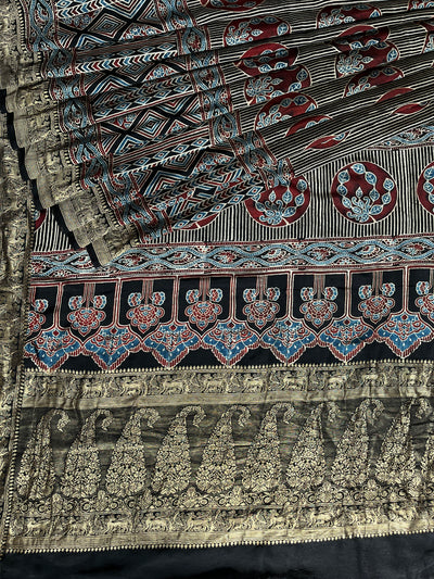 HEMA: Handblock Ajrakh Dola Silk Saree with Meenakari Pallu