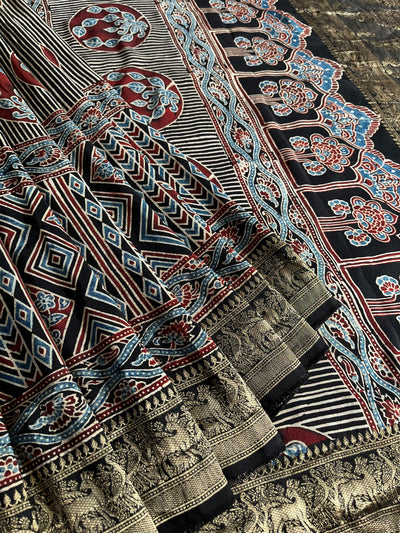 HEMA: Handblock Ajrakh Dola Silk Saree with Meenakari Pallu