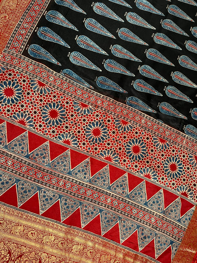 CHARVI: Handblock Ajrakh Dola Silk Saree with Meenakari Pallu