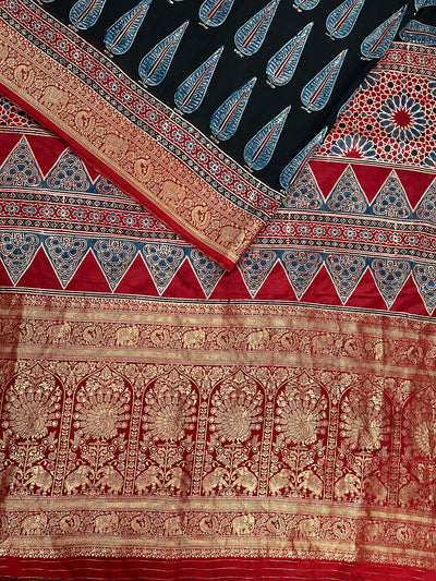 CHARVI: Handblock Ajrakh Dola Silk Saree with Meenakari Pallu