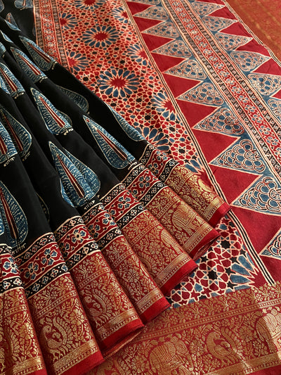 CHARVI: Handblock Ajrakh Dola Silk Saree with Meenakari Pallu