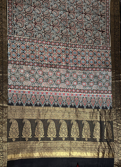 TAPTI: Handblock Ajrakh Dola Silk Saree with Meenakari Pallu