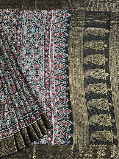 TAPTI: Handblock Ajrakh Dola Silk Saree with Meenakari Pallu