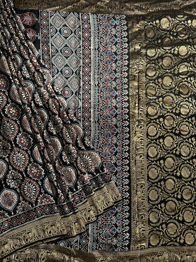 KAMINI: Handblock Ajrakh Dola Silk Saree with Meenakari Pallu