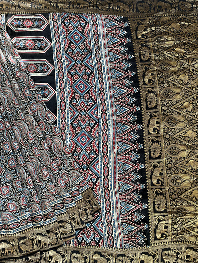 JAISVI: Handblock Ajrakh Dola Silk Saree with Meenakari Pallu