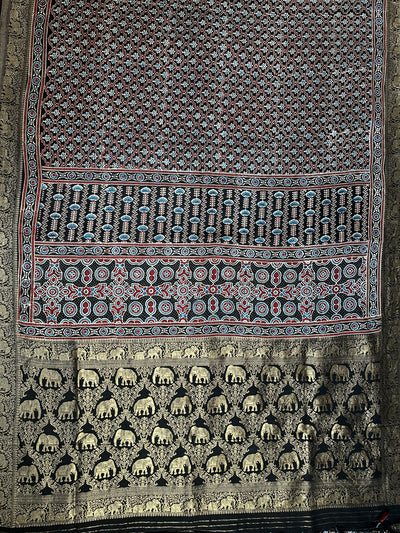 NIYATI: Handblock Ajrakh Dola Silk Saree with Meenakari Pallu