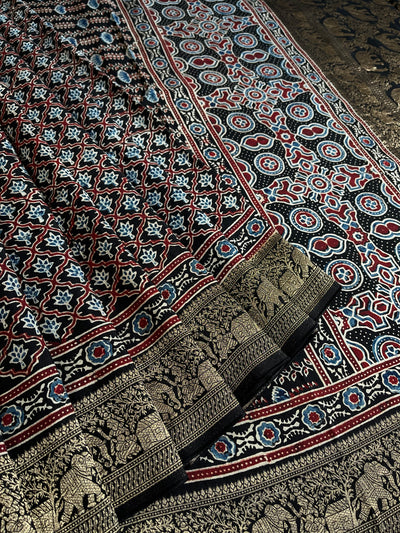 NIYATI: Handblock Ajrakh Dola Silk Saree with Meenakari Pallu