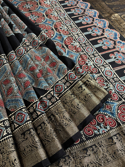 AMRITA: Handblock Ajrakh Dola Silk Saree with Meenakari Pallu