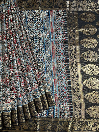 JASLEEN: Handblock Ajrakh Dola Silk Saree with Meenakari Pallu