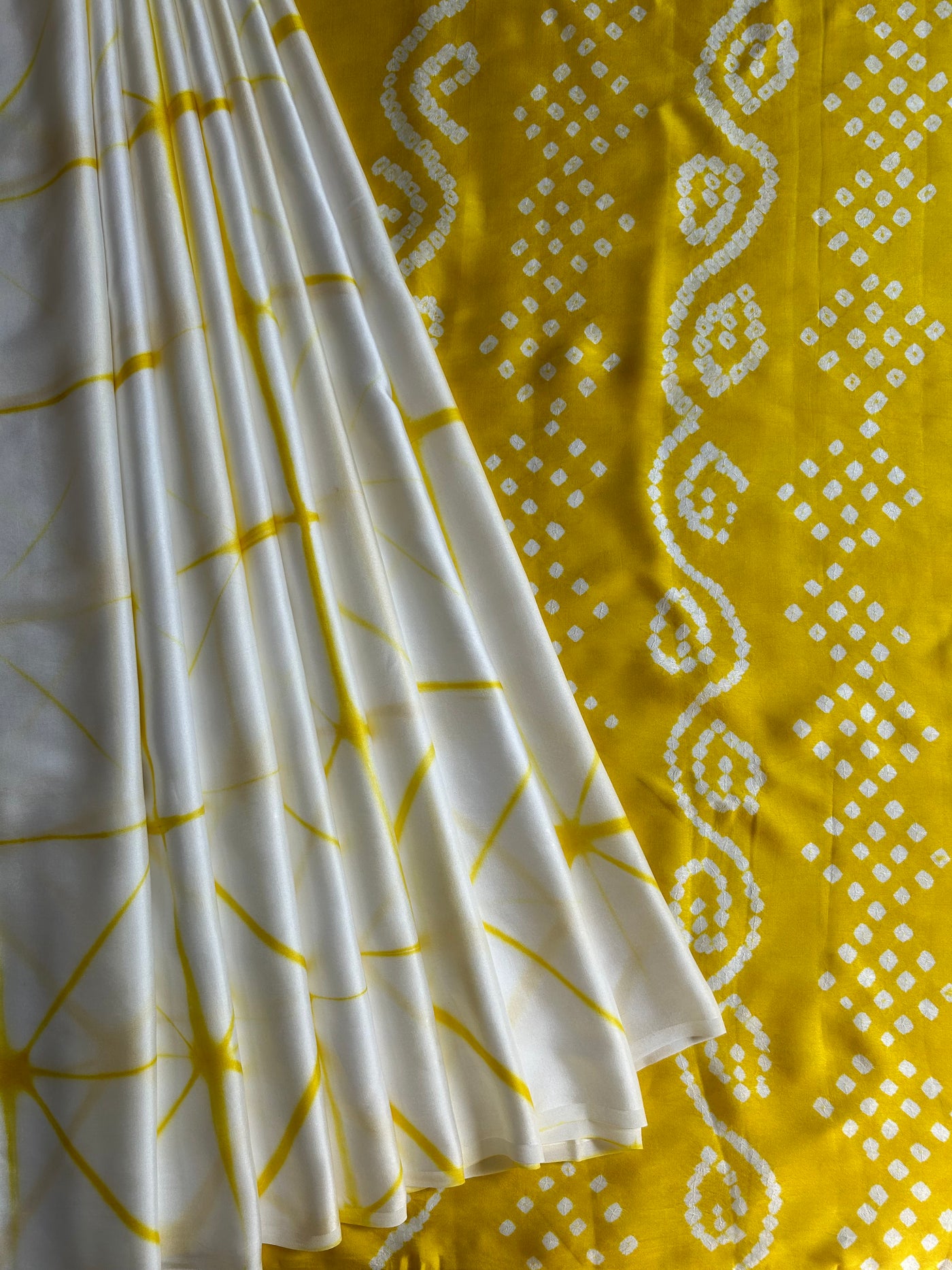 GUNJA: Handmade Clamp Dye- Bandhej Modal Silk Saree