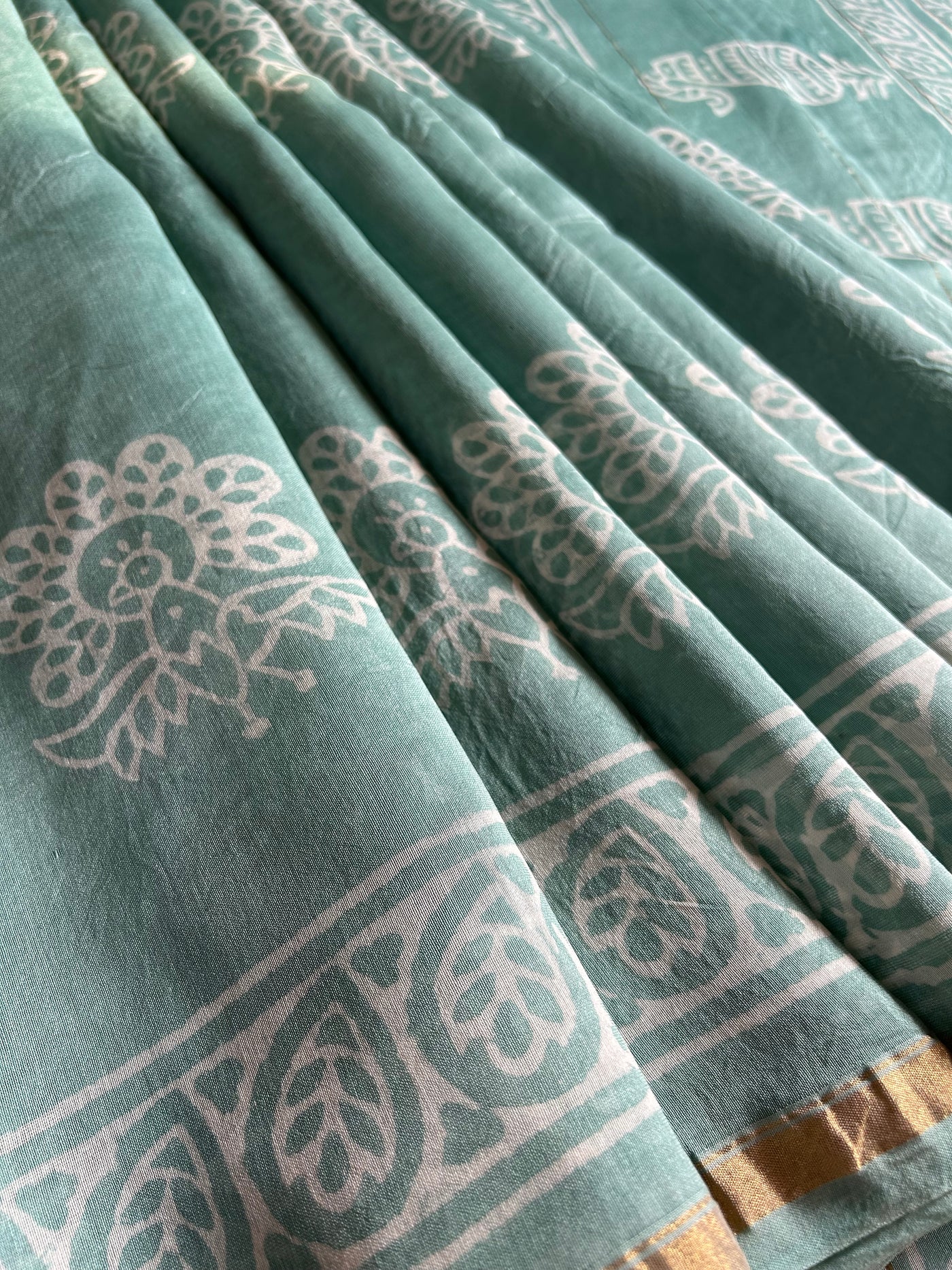 ICY CANDY: HANDBLOCK BAGRU PRINT CHANDERI SILK-COTT SAREE WITH ZARI BORDER.